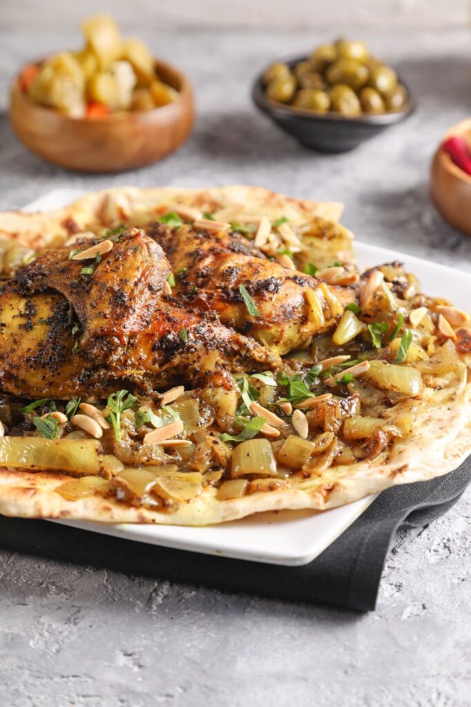 Musakhan roast chicken with sumac onions and almonds at Abu Rass in Paterson, NJ