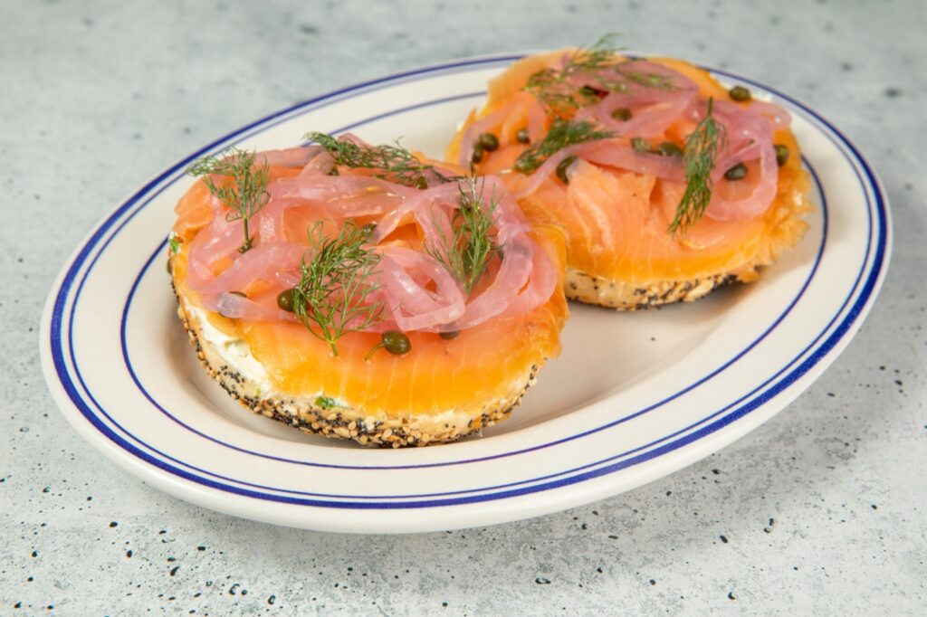 Everything bagel with lox, pickled onions, capers and dill at Dough Bros in Williamsburg, Brooklyn