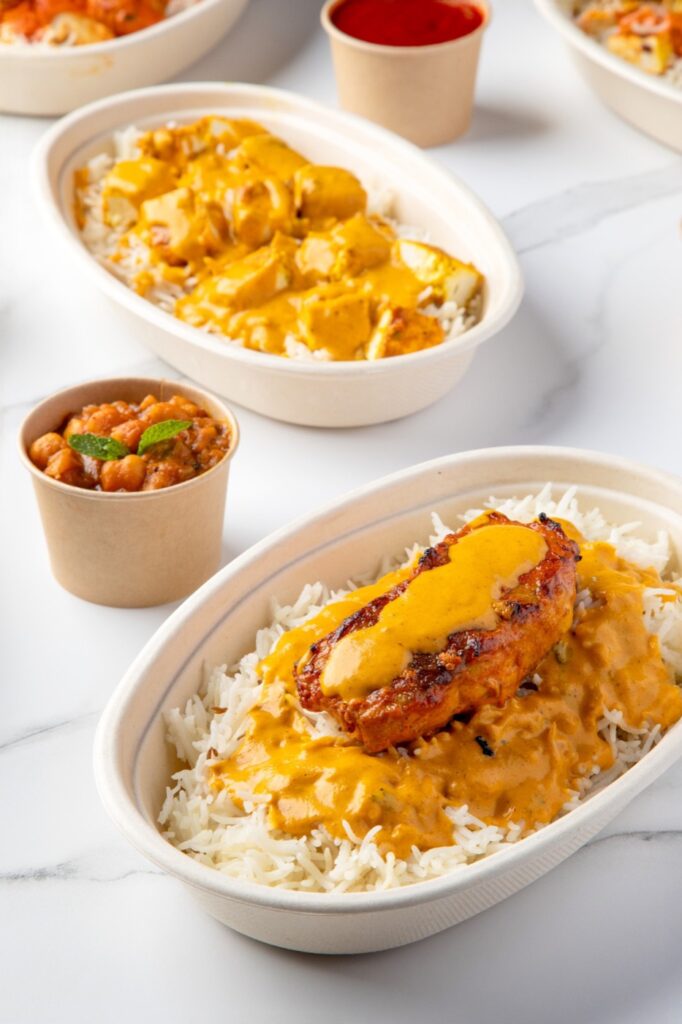 Chicken tikka masala and paneer bowls with chana masala at Tandoori Twist in Valley Stream, Long Island