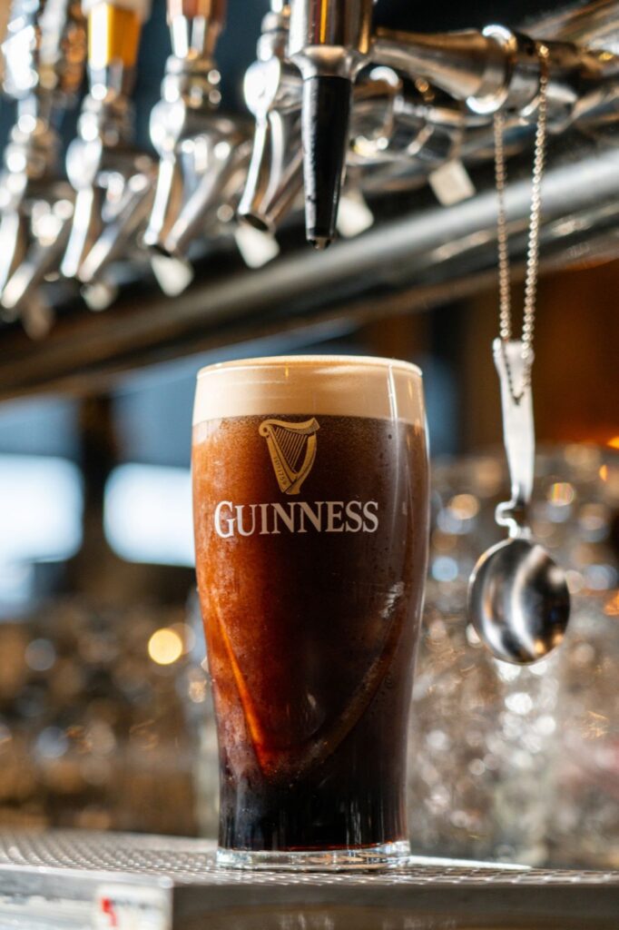 Fresh pint of Guinness under the taps at Taphouse Grille in Hackettstown, NJ